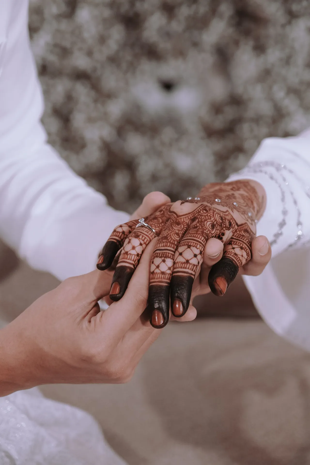 Henna and hands · Illustrative photograph by Faheem Ahamad